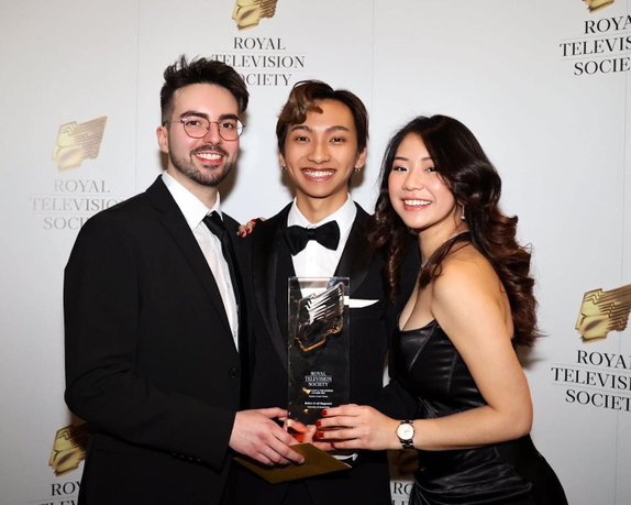 Tiago Francisco with two other Sunderland students holding a Royal Television Society award