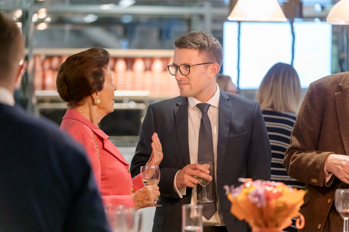 Guests at the dinner talking
