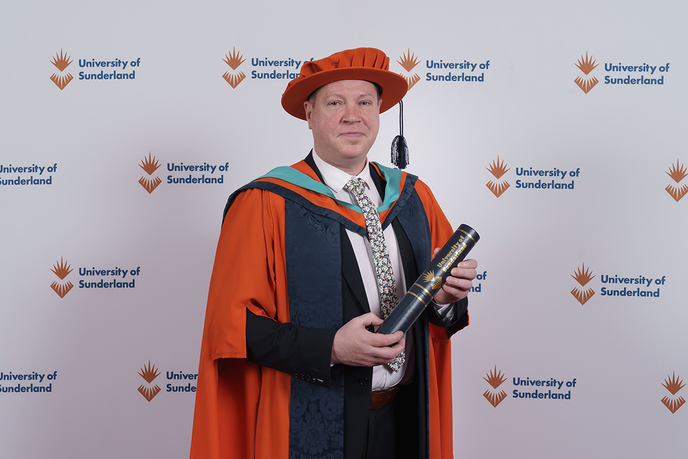 Honorary in cap and gown