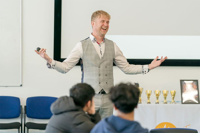 Apprentice star Adam Corbally working with students at the University of Sunderland's Business Boardroom Battle