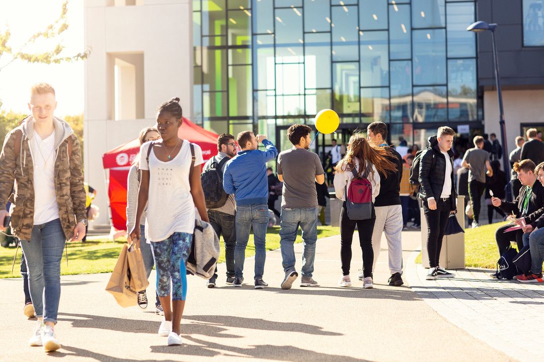 Image of students walking around the Welcome Fair