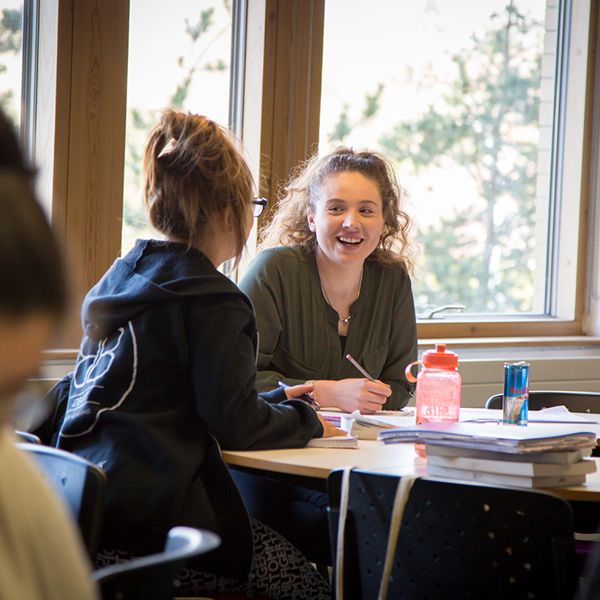 Sudent in classroom smiling