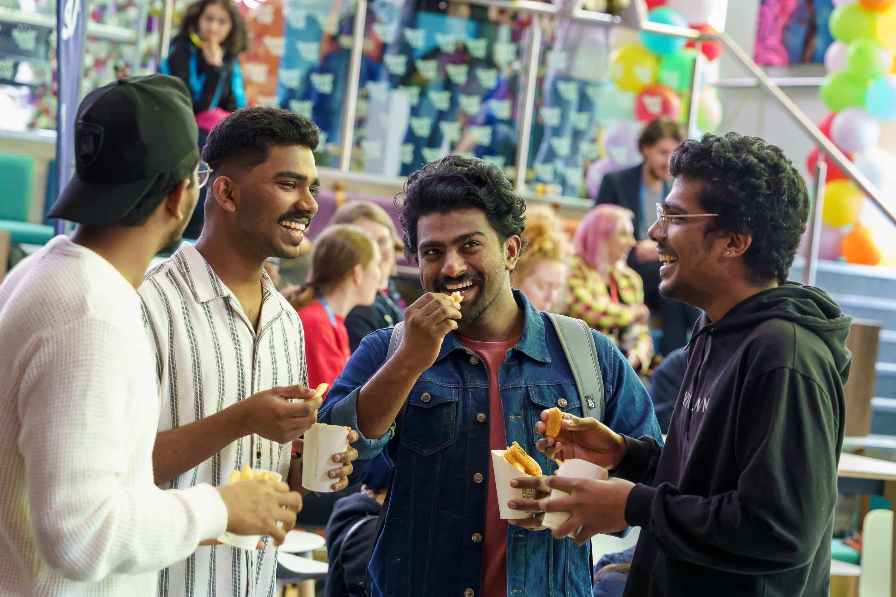 Students eating at the Global Food Festival