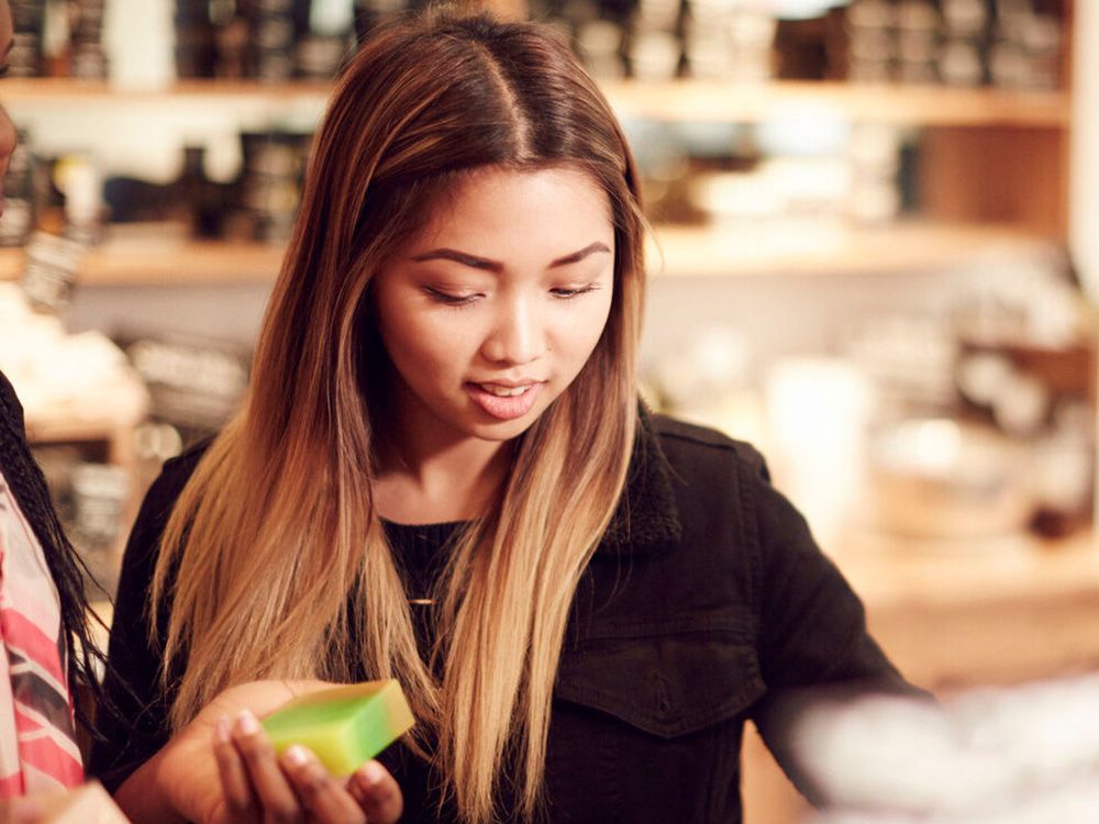 A student browsing in a shop