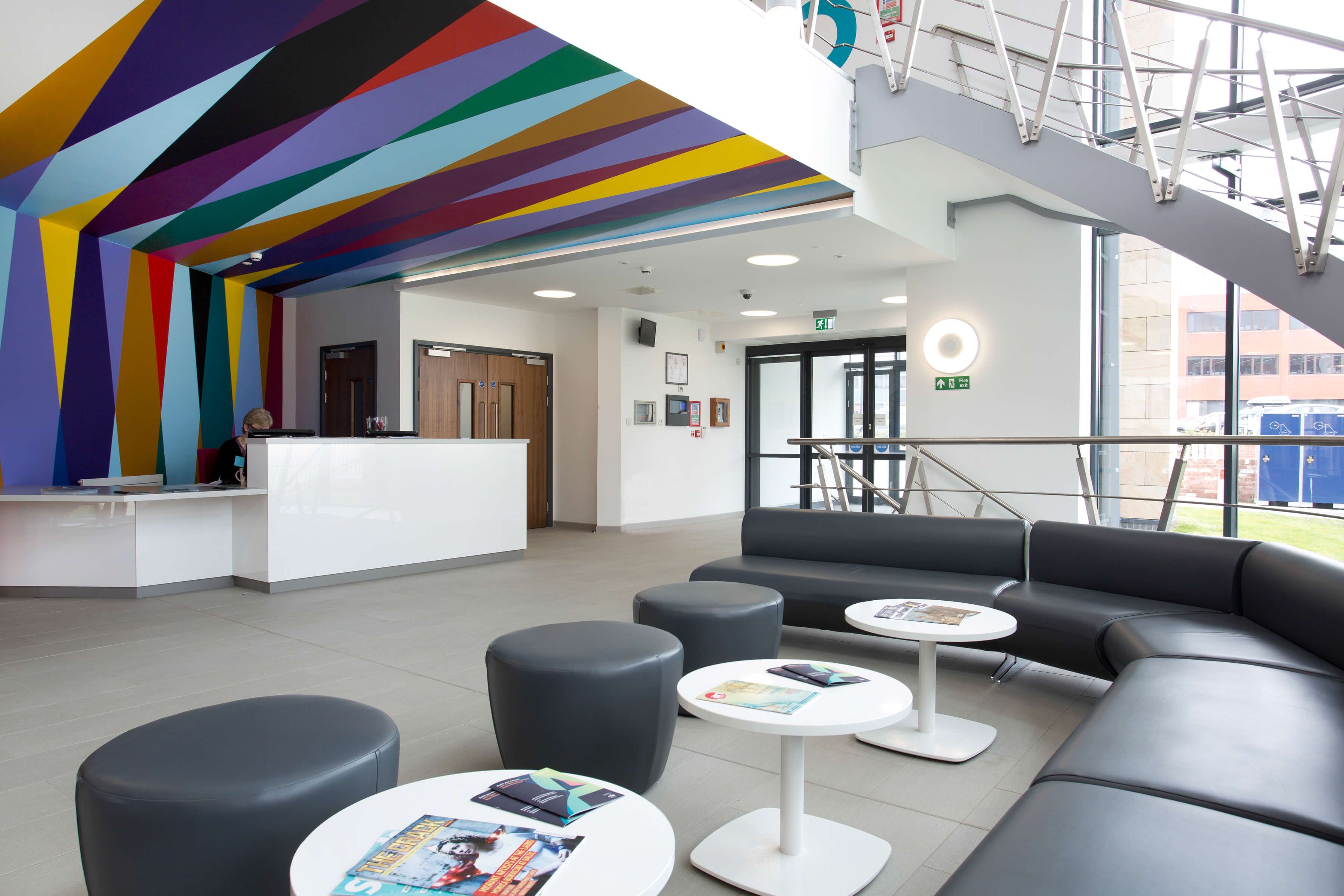 Main reception of Hope Street Xchange, featuring reception desk and waiting area