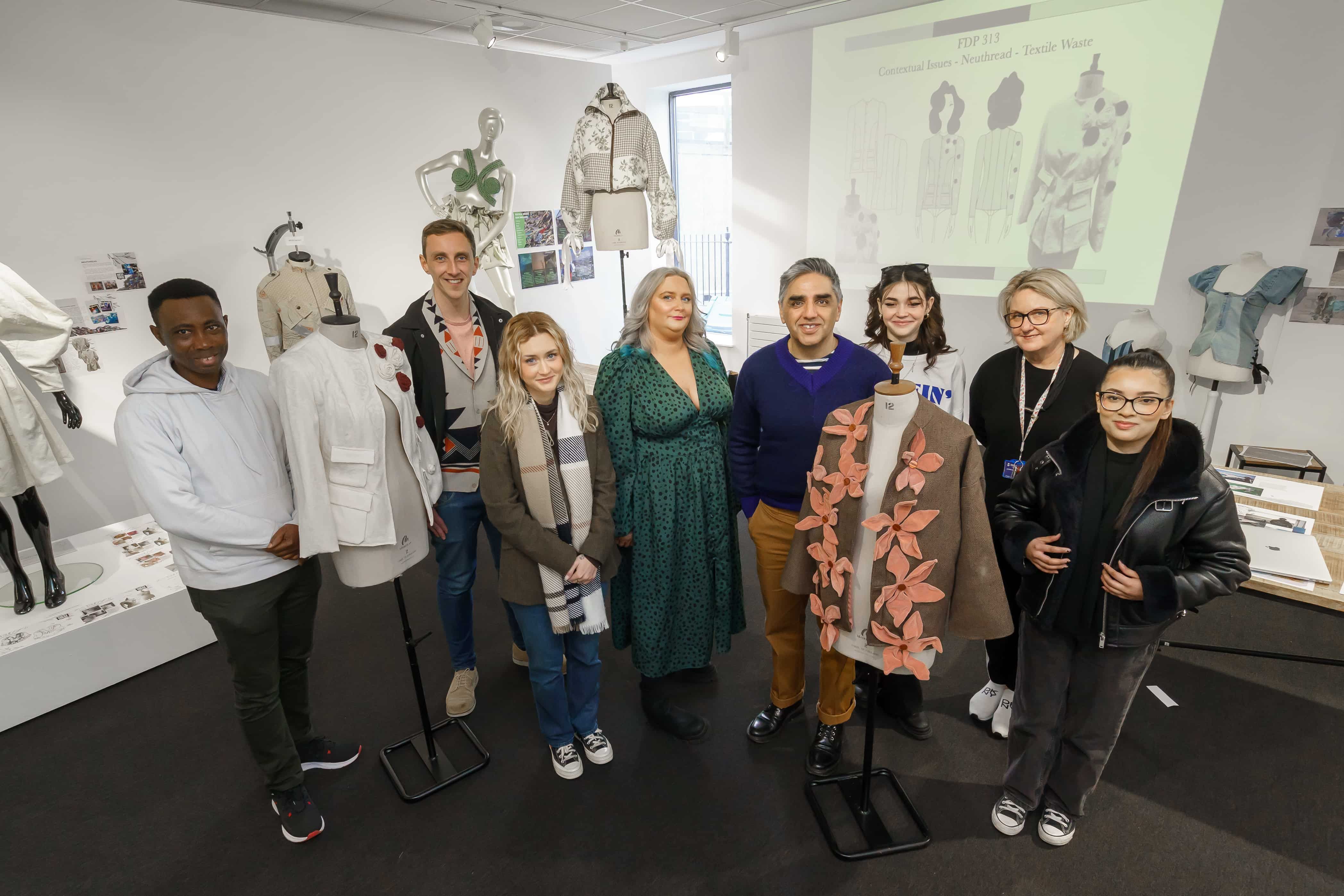 Fashion students and programme leader with the Head of Business Development and Economic Generation at Daisy Chain, standing in a fashion studio