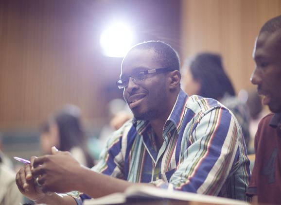 A student sitting in a lecture