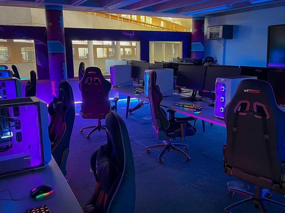 Computer chairs and PCs in a games lab