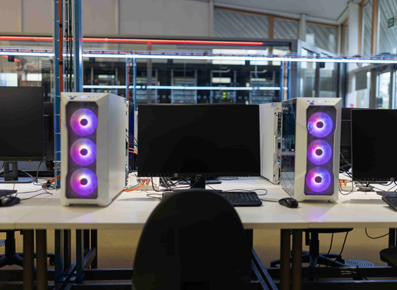 A computer screen with a set of speakers