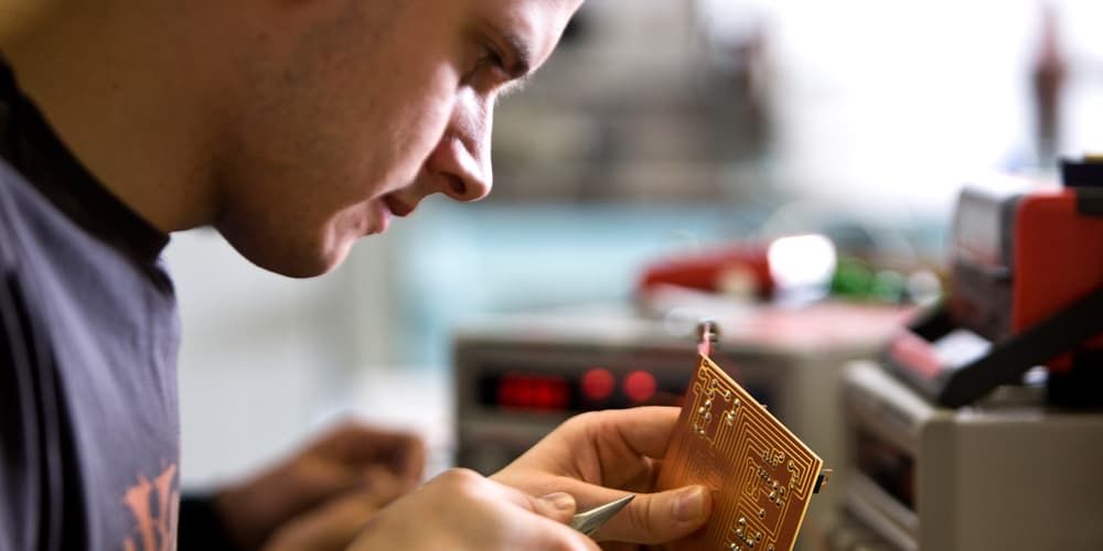 Student working on circuit board