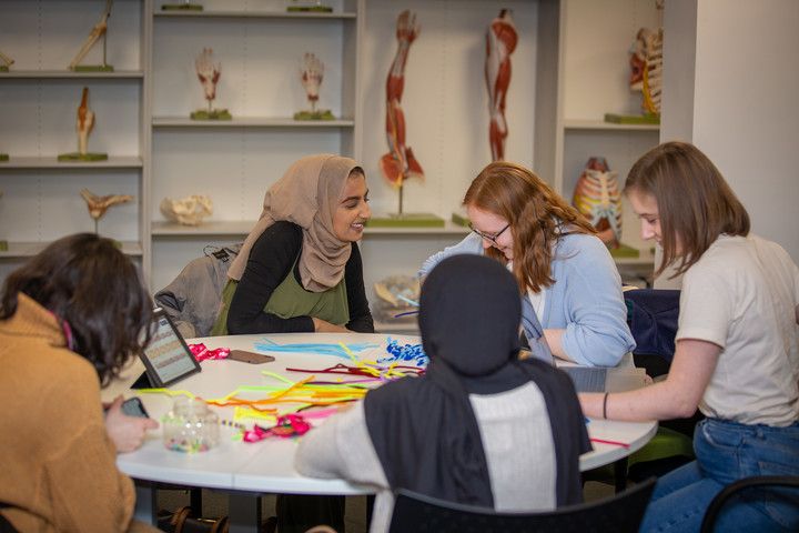 Students sitting at table during PBL session