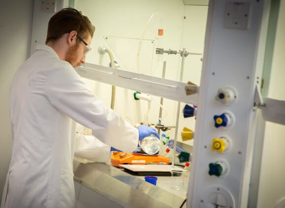 A student carrying out an experiment in the lab