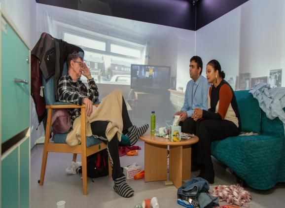 Psychology and Pharmacy students collaborating on a project in the immersive suite