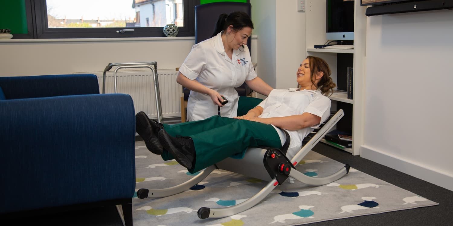 occupational therapy students practising using the equipment together