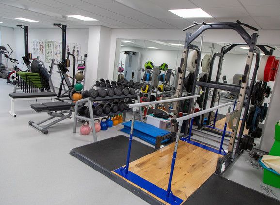 Clinical Rehabilitation & Exercise Therapy Suite with fitness equipment