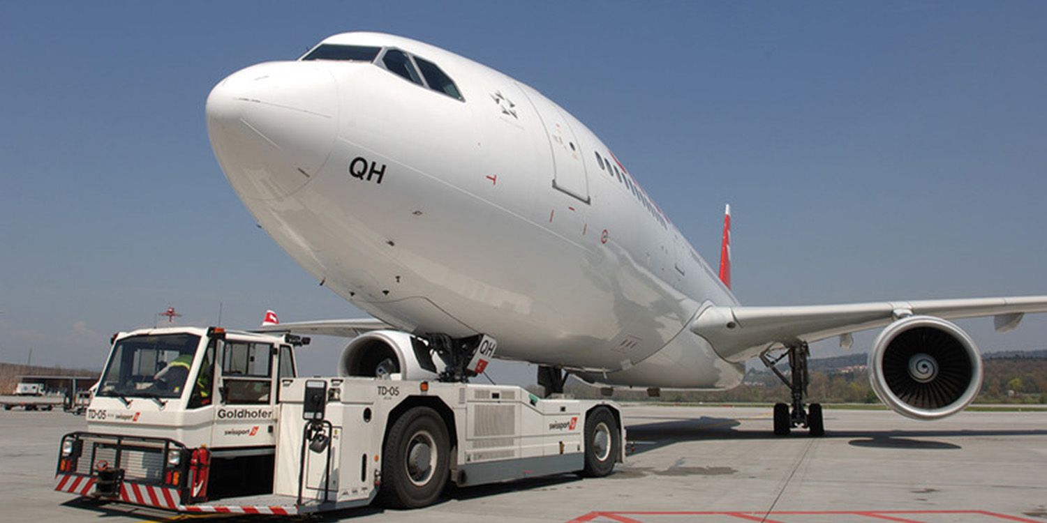 An aeroplane stationary on a runway