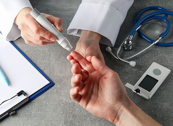 A doctor giving a patient diabetes medication